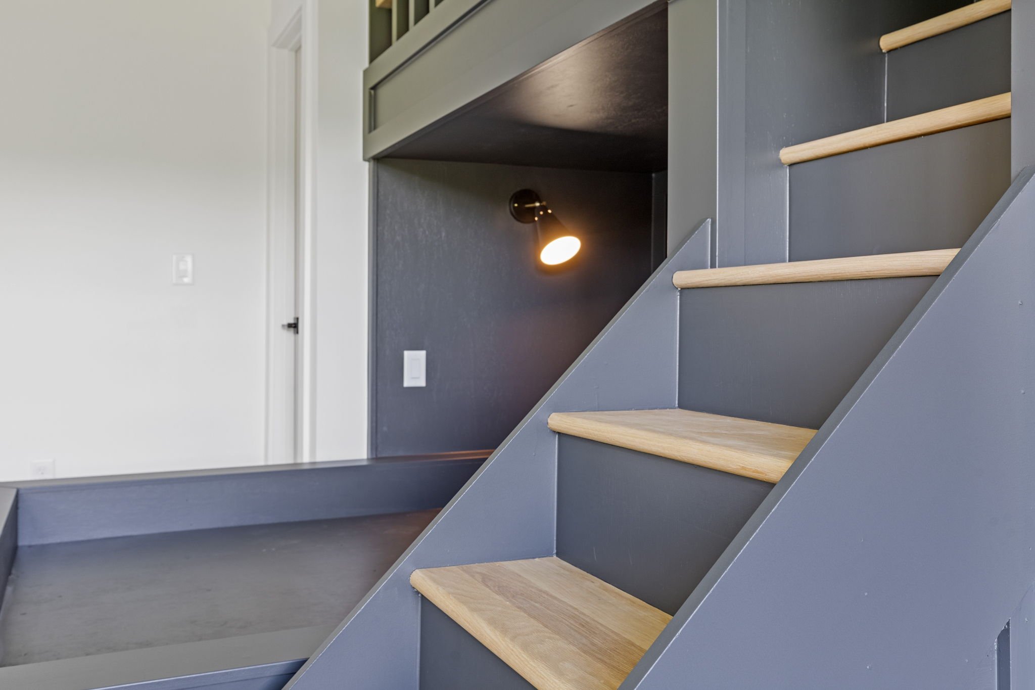 Custom bunk stair detail with accent lighting