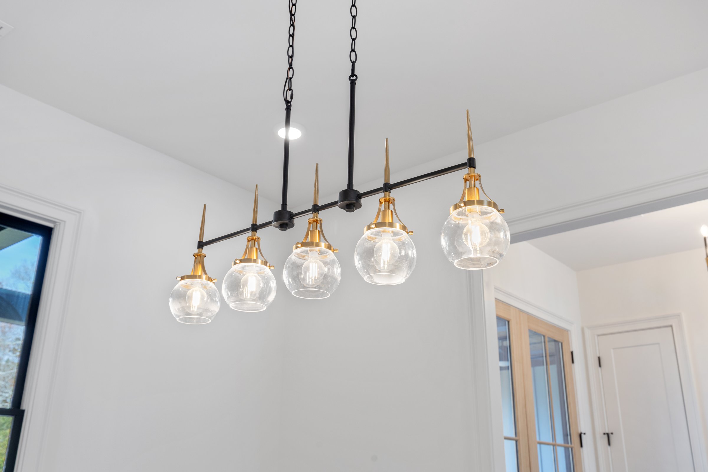 Black and brass dining chandelier