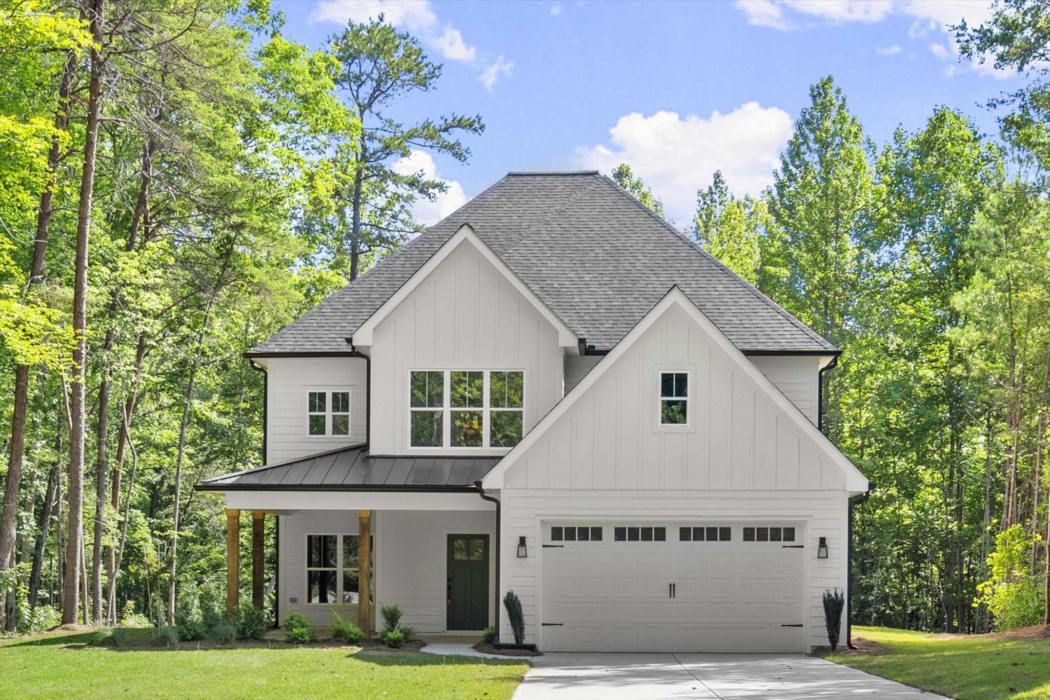Forest and Stone — front elevation in the trees